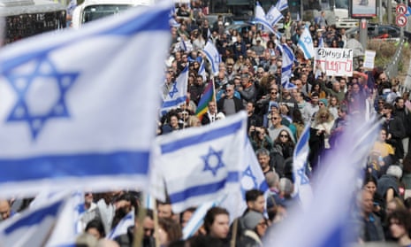 People gather for a protest outside the Knesset in Jerusalem