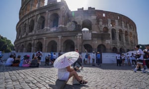 Tourists at the Colosseum in Rome swelter in the soaring heat a day after a new record-high temperature of 41.8C was measured in the capital.