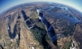 Aerial view of Victoria Falls and the Zambezi River at the border of Zimbabwe and Zambia