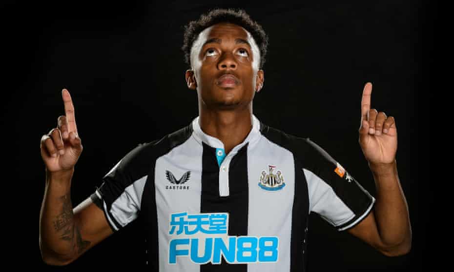 Joe Willock poses after completing his move to Newcastle from Arsenal.