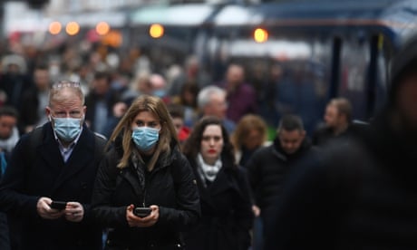 Travellers arrive at King’s Cross station in London in late February.