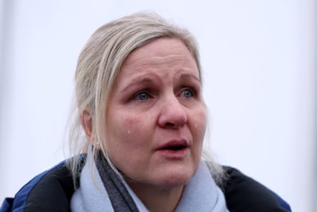Kirsty Coventry speaks to the media as tears stream down her face after Vladyslav Heraskevych of Team Ukraine (not pictured) was disqualified from competing at the 2026 Winter Olympics