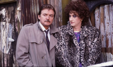 Paul O’Grady as Roxanne in The Bill, 1989, with Tony Scannell as DS Roach.