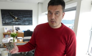 Greenland’s prime minister Kim Kielsen with an oil-bearing rock from Nuuk