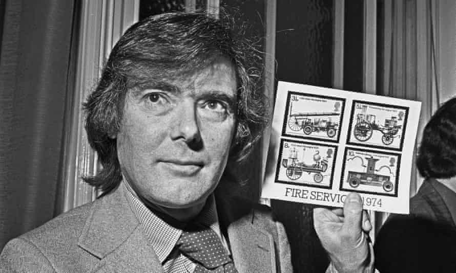 David Gentleman holding his design for a fire service commemorative postage stamp UK, 1974.