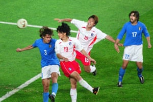 South Korean midfielder Ahn Jung-hwan (second left) heads the ball past Italian defender Paolo Maldini for a ‘golden goal’ in their second round match at the 2002 World Cup.