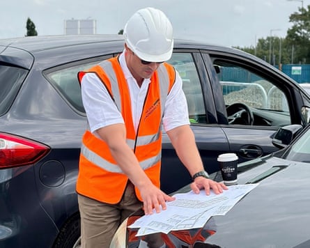 Arian, pictured working in his new job as a civil engineer in the UK.