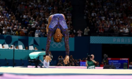 Simone Biles in action on the floor, shortly before clinching gold