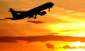 A plane against the sunset