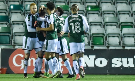 Plymouth celebrate Graham Carey’s goal in a 4-2 win over AFC Wimbledon which continued their impressive form.