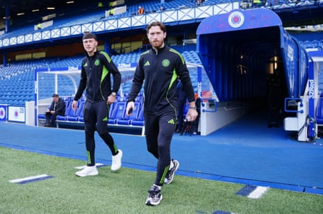Celtic’s Anthony Ralston walks on to the pitch to warm up.