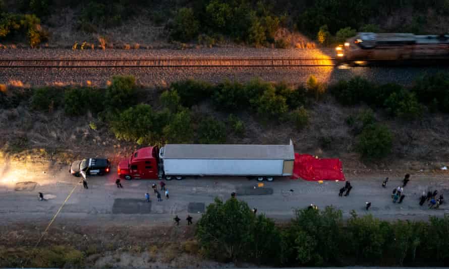 Fifty suspected migrants were found dead and at least a dozen others were hospitalized after being found inside an abandoned tractor-trailer rig on Monday.