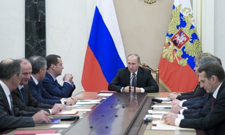 Vladimir Putin chairs a security council meeting in the Kremlin on Friday.