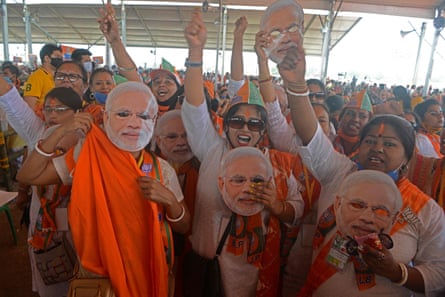 BJP supporters attend a rally on the outskirts of Siliguri on 10 April.