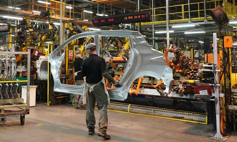 Workers on the production line at Nissan's factory in Sunderland.