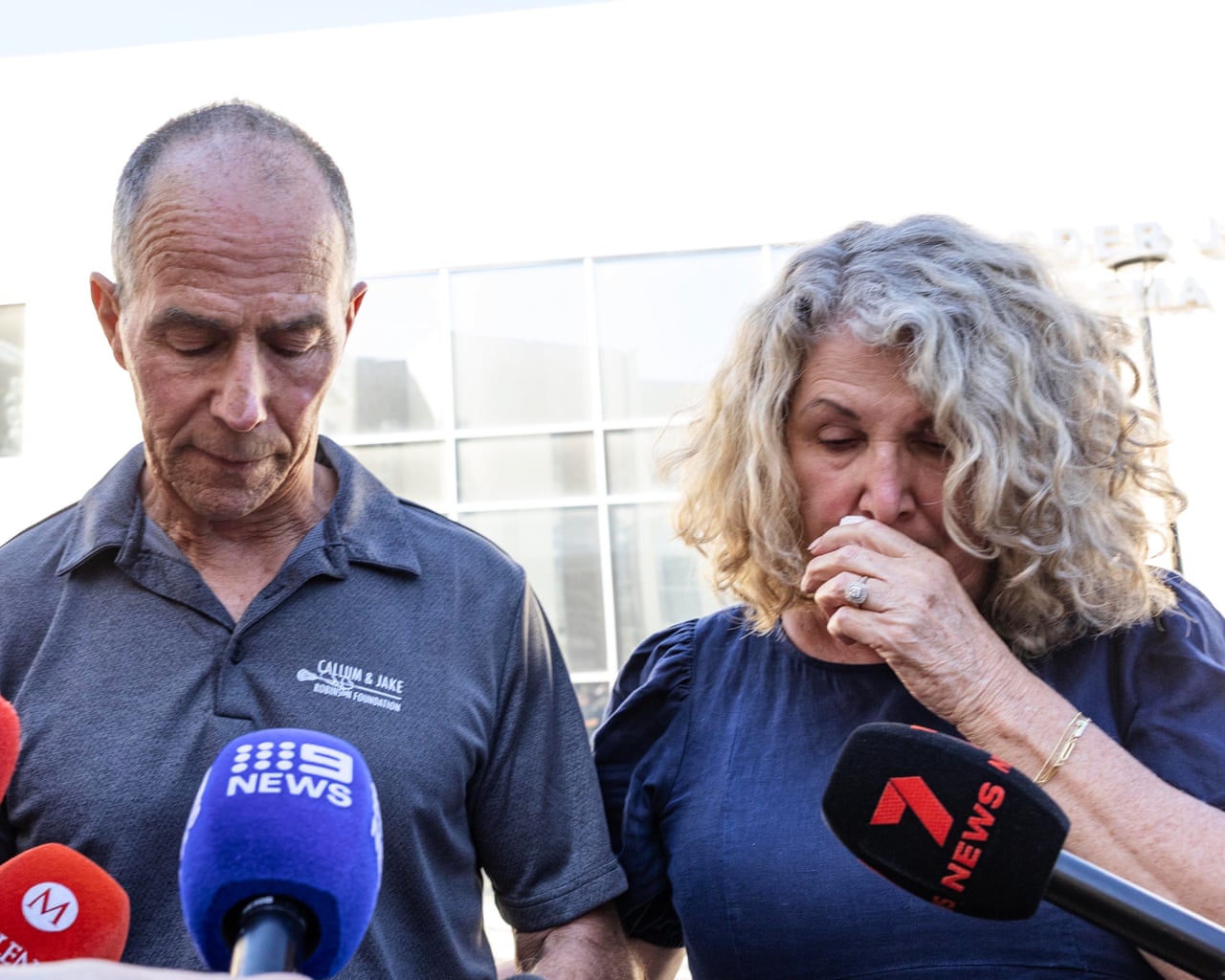 Debra and Martin Robinson, parents of Australian brothers Callum and Jake Robinson, during a news conference outside court after the verdict