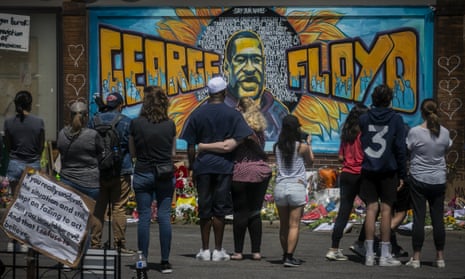 A mural of George Floyd near the spot where he died while in police custody in Minneapolis.