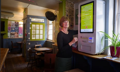 Gillian Dean, consultant HIV physician at Brighton and Sussex University hospitals NHS trust, with an HIV test vending machine.