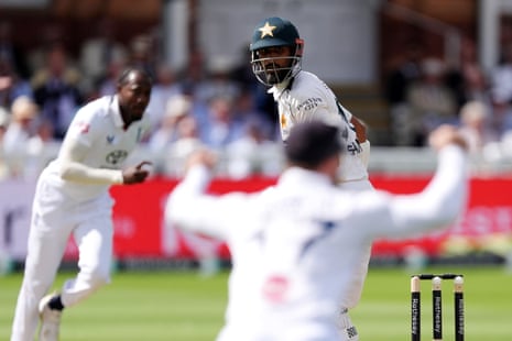 Pakistan's Shan Masood is caught out by England's Jamie Smith from the bowling of Jofra Archer.