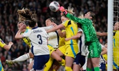 England's goalkeeper Mary Earps, center right, clears the ball during the Euro 2025 group A3 qualifying soccer match between England and Sweden at the Wembley stadium in London, Friday, April 5, 2024. (AP Photo/Dave Shopland)