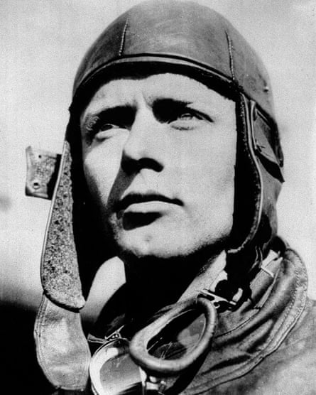 Lindbergh wears a leather flying helmet similar to the one he lost in Paris in 1928.