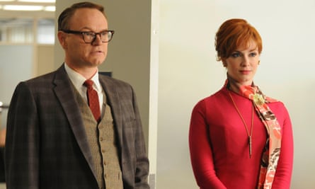 As Lane Pryce in Mad Men, with Christina Hendricks as Joan Holloway.