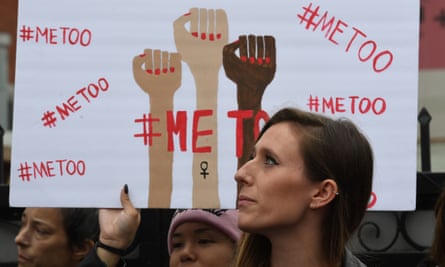 Feamle protesters with #metoo placards