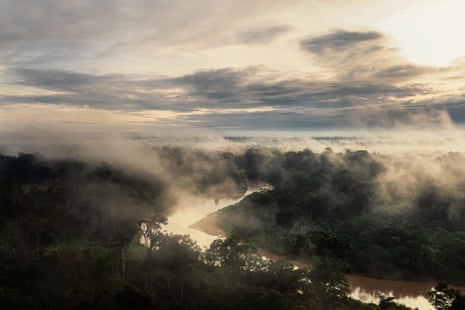 Mist over the Amônia River at sunrise.