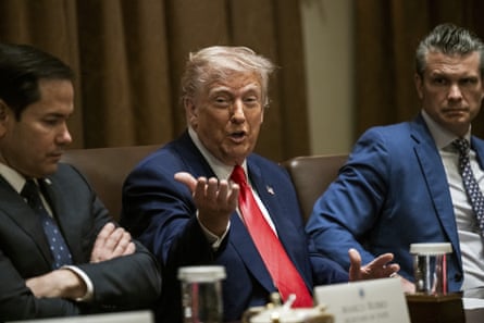 Donald Trump with secretary of state Marco Rubio, left, and defence secretary Pete Hegseth, right.