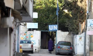 A woman arrives at a UN compound in the Balata refugee camp near the West Bank city of Nablus.