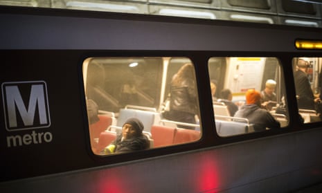 Passengers ride a Washington Metro subway train in Washington, DC.