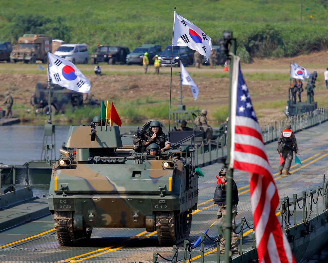 A South Korean armored vehicle crosses a pontoon bridge during a joint US-South Korea drill