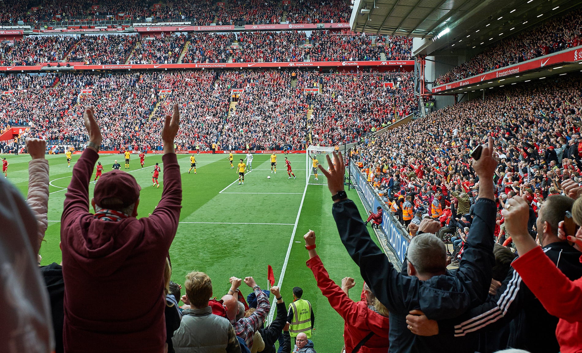 Liverpool fans celebrate during their win over Wolves on the final day of last season, but it was not enough to deny Manchester City the title.