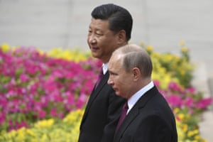 Russia's President Vladimir Putin seen with Chinese President Xi Jinping.