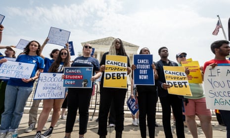 Students protest the supreme court’s ruling against Biden's student-debt relief program.