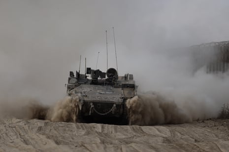 A view captured near the Gaza border shows tank and armoured vehicle movements of the Israeli army.