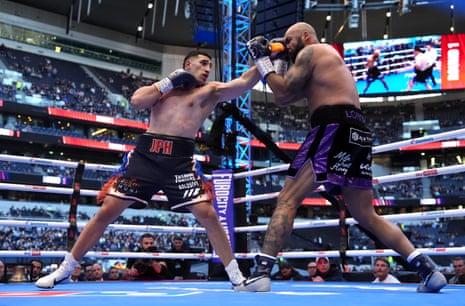 Justis Huni lands on Frazer Clarke.