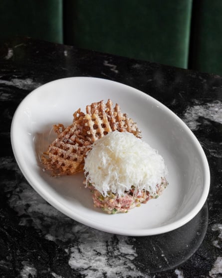A ‘a chunky, oozy little bullet’ of aged beef tartare with parmesan game chips at Lennox Manchester.