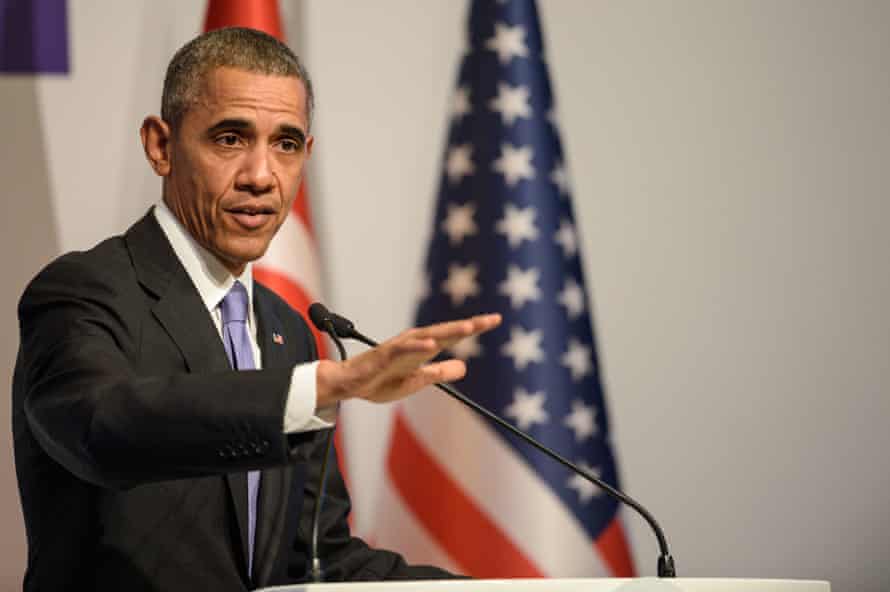 Barack Obama gestures during a press conference