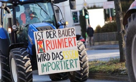 A sign on a protesting farmer’s tractor saying ‘If the farmers are ruined, your food will be imported’