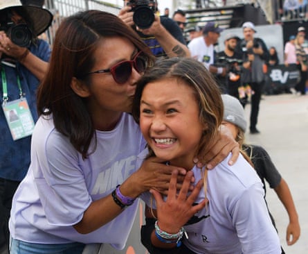 Sky Brown celebrates with her mother after coming third in the World Park Skateboarding Championship in Sao Paulo on September 14, 2019