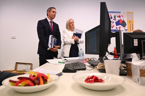 Jim Chalmers and the finance minister, Katy Gallagher, visit the budget lockup at Parliament House yesterday.