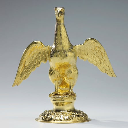 The ampulla from which the chrism oil is poured.