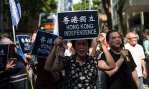 Pro-democracy activists march against a proposal to ban the pro-independence Hong Kong National Party in July