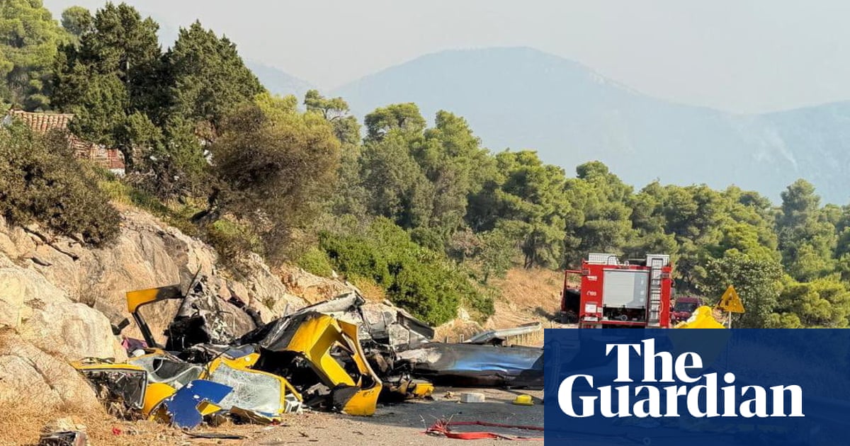 Two helicopters collide outside Athens as Greece battles to control wildfires