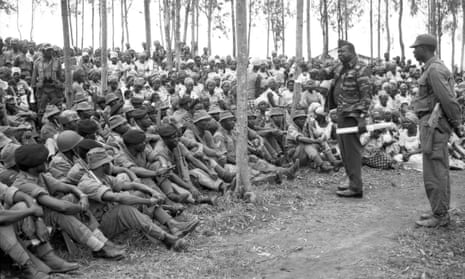 Amin addresses troops during a visit to border regions