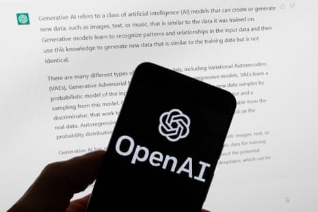 A photo illustration shows the OpenAI logo on the screen of a mobile phone. In the background is a page of text.