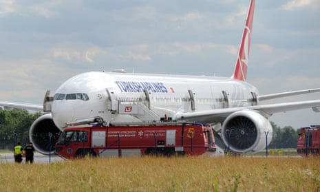 Emergency vehicles attend the Turkish Airlines flight at Warsaw’s Chopin airport.
