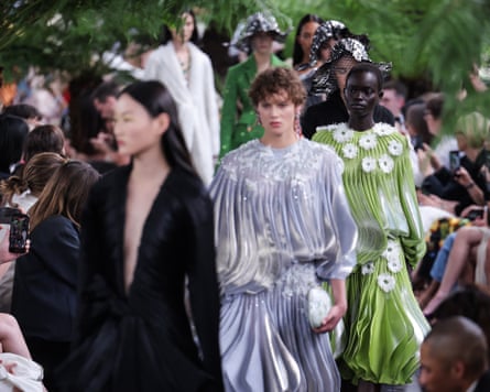 Models walk down the catwalk