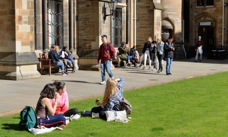 Students sitting in the University of Glasgow campus.